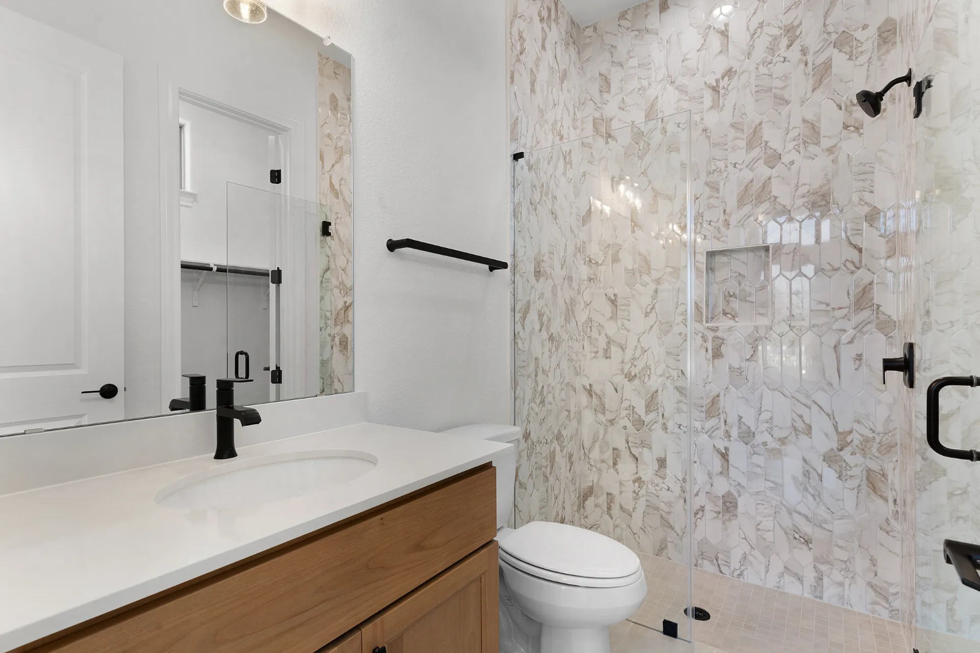 Mud-set shower with frameless glass