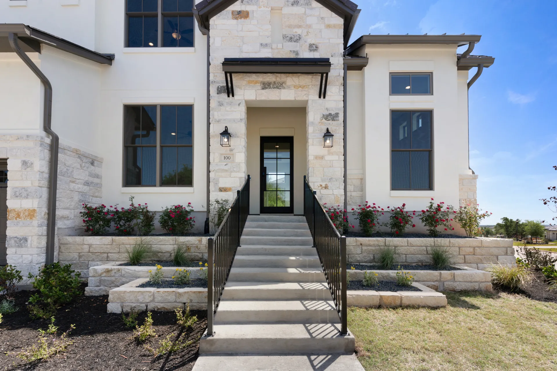 Entry with staircase and gallery hallway