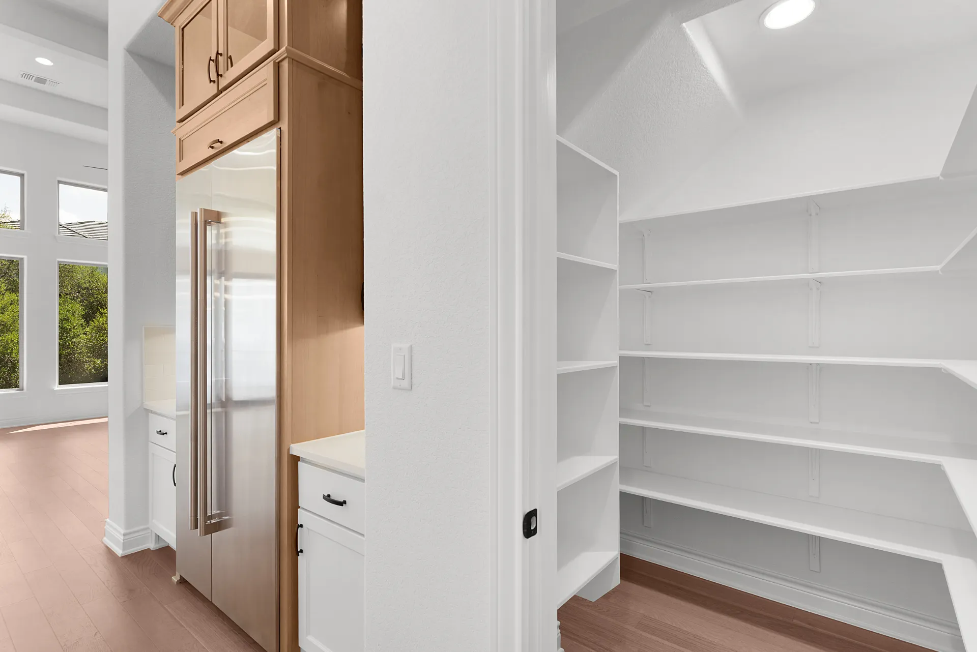 Walk-in pantry with custom shelving